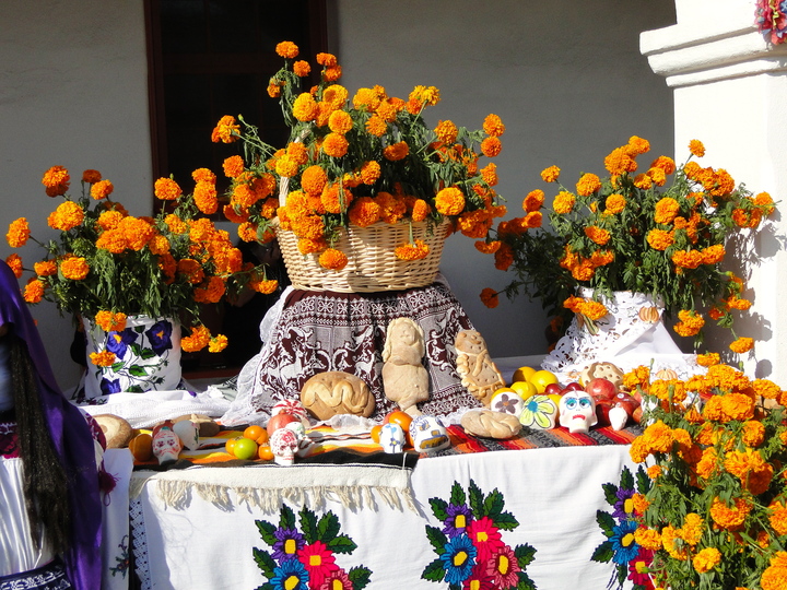 altar with bread and skulls