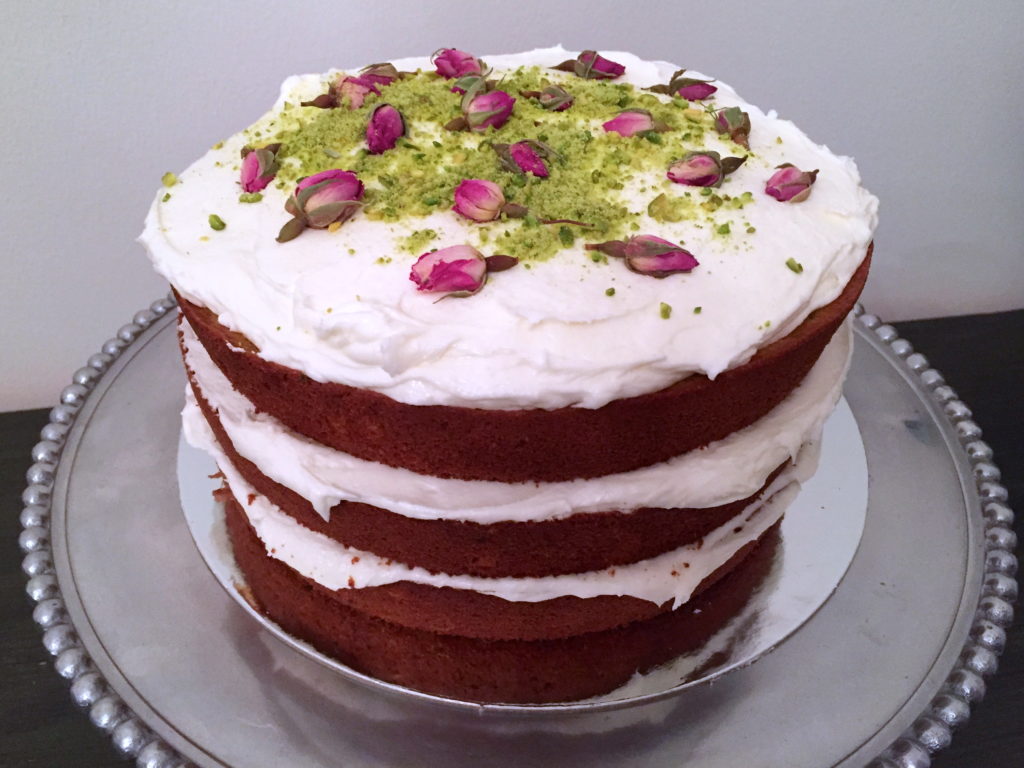 pistachio cardamom cake with rose orange frosting