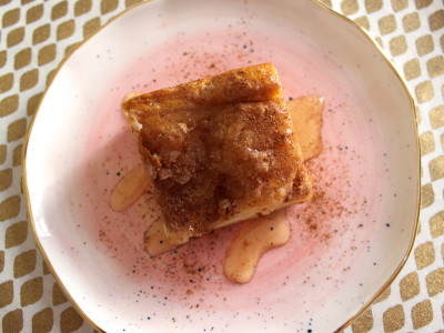 Easy sopapilla cheesecake bars with cinnamon sugar and honey